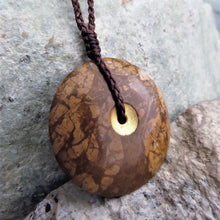 Sun and Moon Disc carved from Yellow Jasper we found at our favourite local fossicking spot.