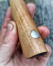 Knife handle close-up showing the railway wrought iron plug detail in the back end of the railway pile wooden handle