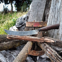 Wagon Wheel Carving Knife on Victorian wagon wheel wooden spokes with natural background