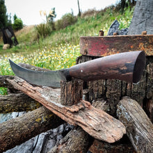 Wagon Wheel Carving Knife on a Victorian wooden wagon wheel surface outdoors 