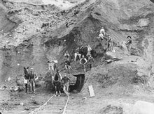 Historical black and white photograph showing railway workers during the construction of the Main North Line in the South Island of New Zealand in c1910. 