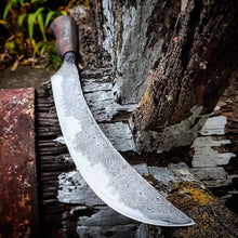 Carving knife angled to show the curve of the blade