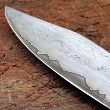 Storm Hunter detail of the three layers of steel, clad in wrought iron.