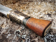 Broad Seax Chopper handle detail showing sand cast bronze bolster and end cap, antler, hardwood and local jasper stone fittings.