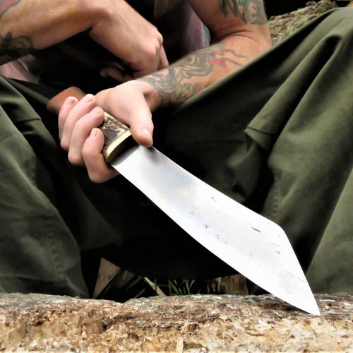 Broad Seax Chopper in the hand of the maker Benjamin Madden