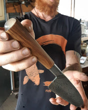 Integral Damascus White Quartz Kitchen Knife in the hands of the maker Benjamin Madden