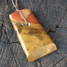 Toki Pendant from Fossilized Wood