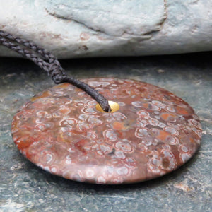 Sun and Moon Disc Pendant carved from New Zealand Spherulitic Rhyolite.